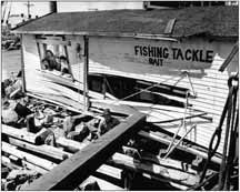 photo of tackle shop destroyed by wave